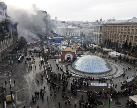 Smoke rises above Independence Square as clashes continue in central Kiev